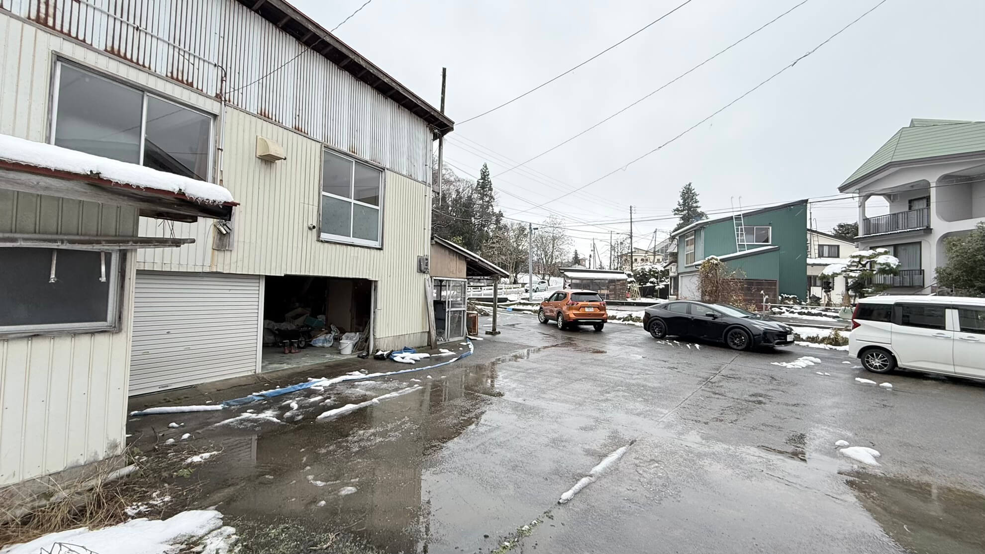 Large parking area and workshop